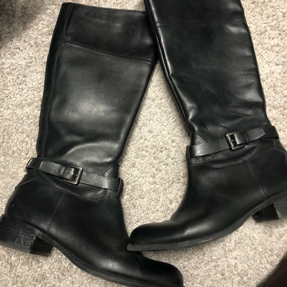 Tall low heeled boots.